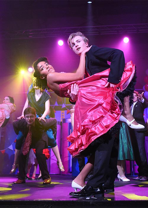 Stunning costumes for Grease the musical prom scene